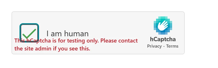 Our page with hCaptcha's public test sitekey after a click: the checkbox shows a green check next to "I am human", and hCaptcha's red notice reads "This hCaptcha is for testing only. Please contact the site admin if you see this."